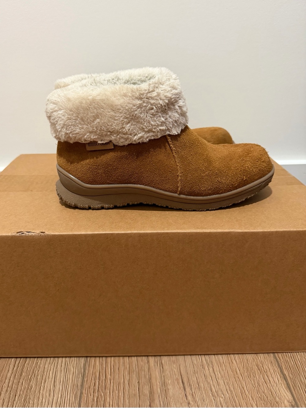 Minnetonka women’s Tan Suede Faux-Fur Cuff Ankle Booties